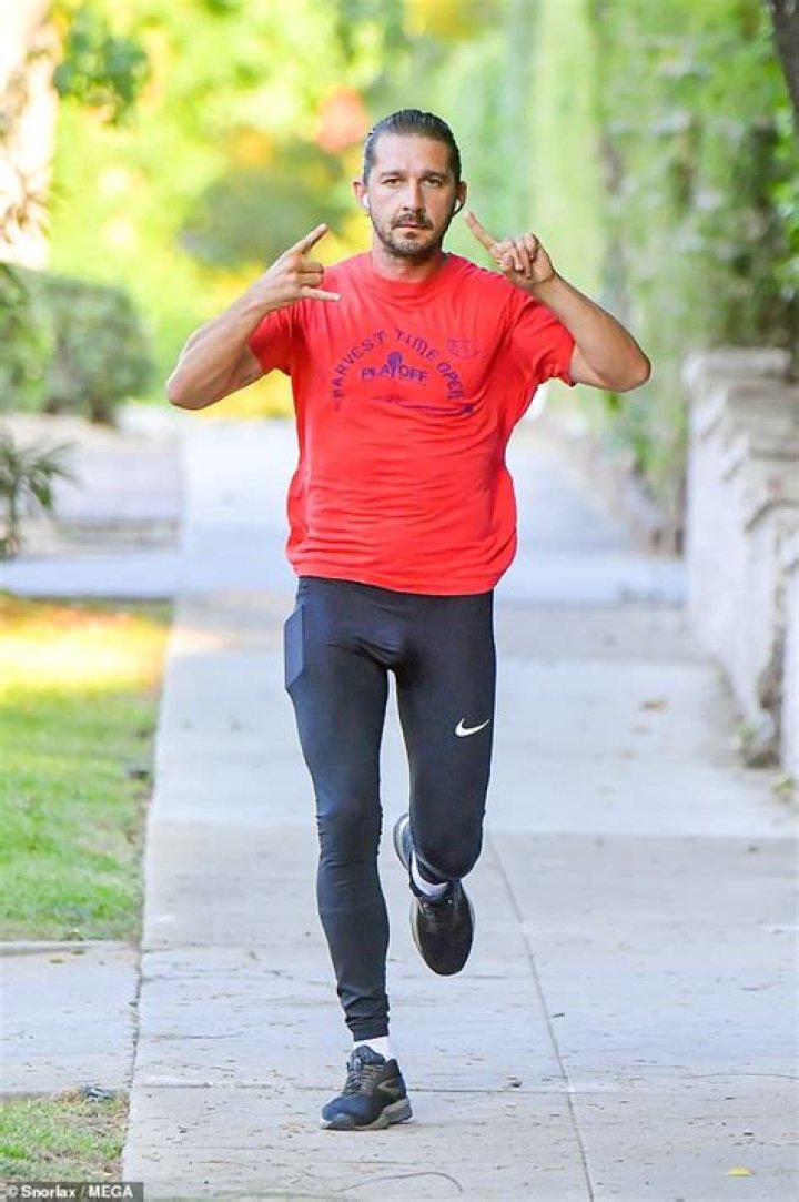 Shia LaBeouf works up a sweat on his daily run in red Tshirt Daily