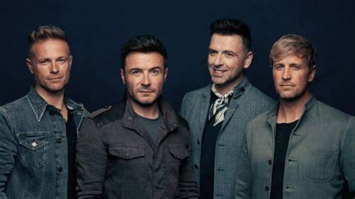 Westlife's Mark Feehily and partner Kevin McDaid arriving at the